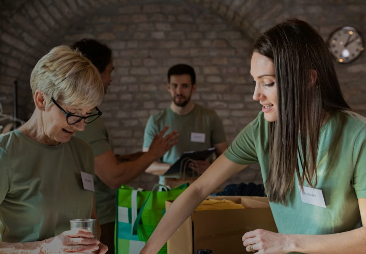 Volunteers sorting donations at a community food bank
